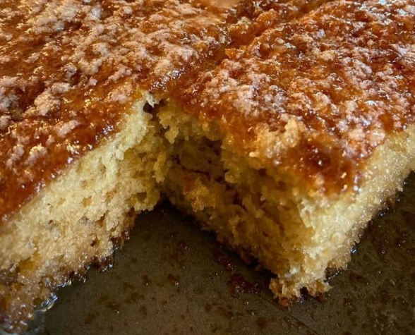 Caramel-Glazed Butter Cake with a rich caramel topping, freshly baked in a 9x13 pan.