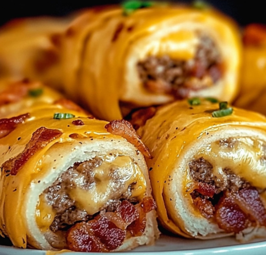 Adding ground beef, bacon, and cheese filling to dough for Garlic Butter Bacon Cheeseburger Rollups Recipe