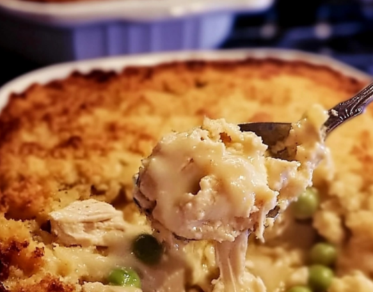 Golden Chicken Dressing Casserole with creamy layers and cornbread stuffing topping