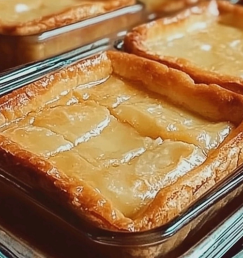 Southern Butter Chess Bars with golden crust and creamy filling, served in a baking dish