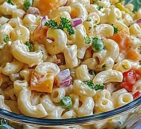 Sweet Macaroni Salad in a glass bowl with colorful vegetables