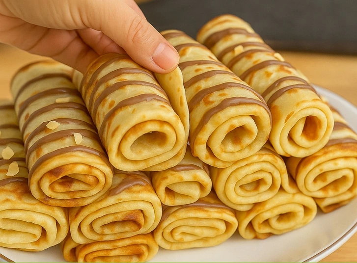 Crêpes moelleuses roulées au chocolat